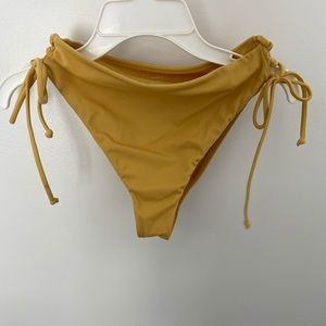 Yellow side tie swim bottoms
